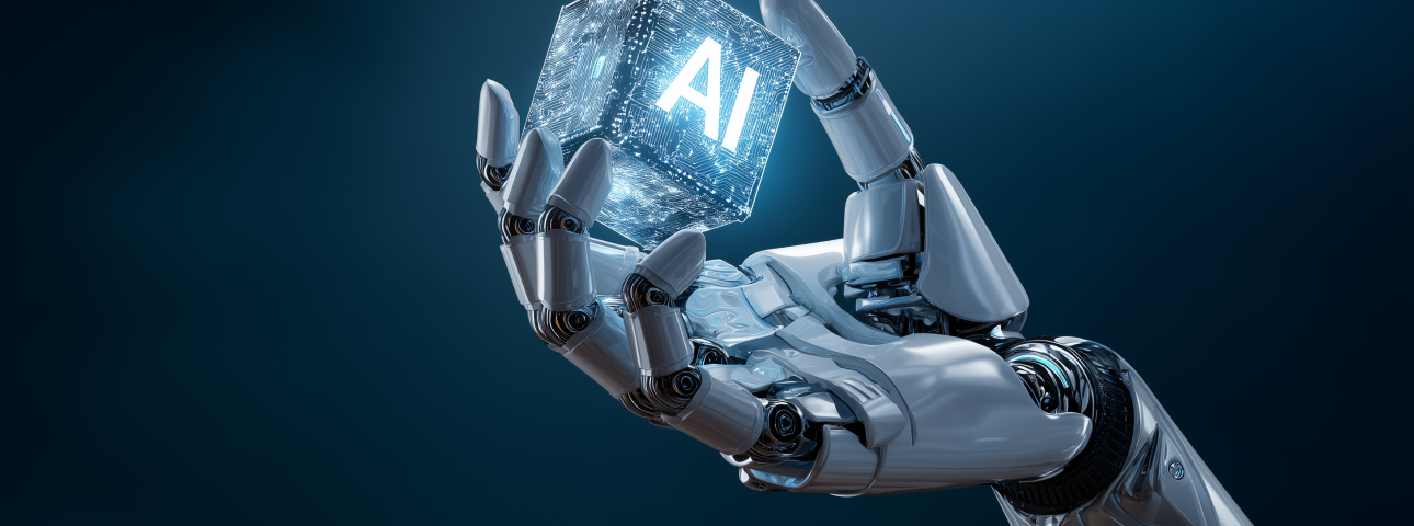 Uma mão robótica branca e metálica segura um cubo digital azul brilhante com o texto "AI", simbolizando inteligência artificial em um fundo escuro.
